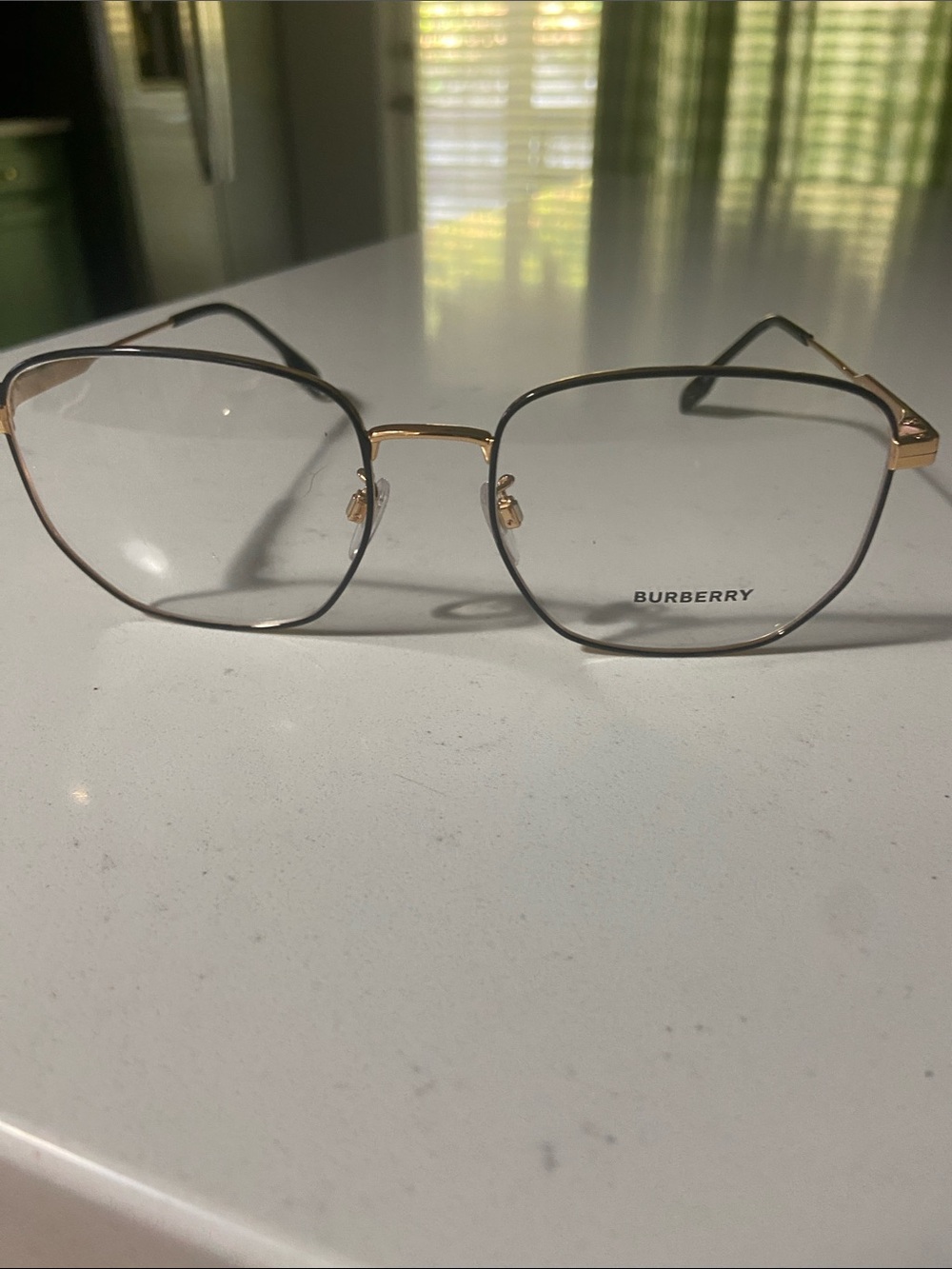 Burberry Women's Black Rim & Gold Metal Frame Glasses new without tag. Frames